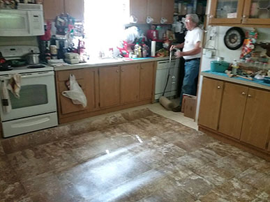 LeRoy Working on Tile Floor